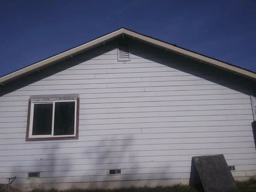 Slide of Mackney Roofing