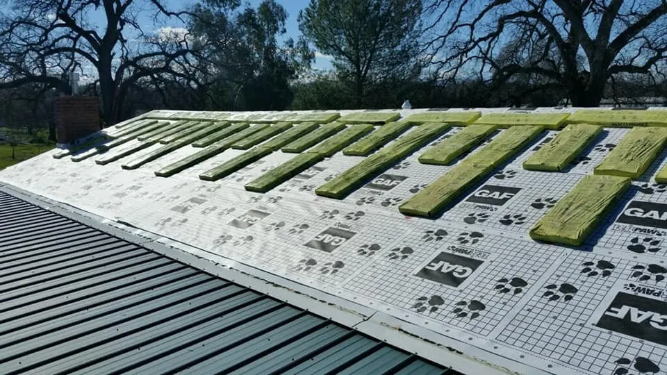 Slide of Mackney Roofing