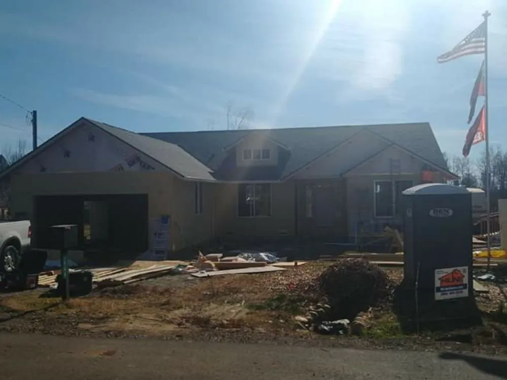 Slide of Mackney Roofing