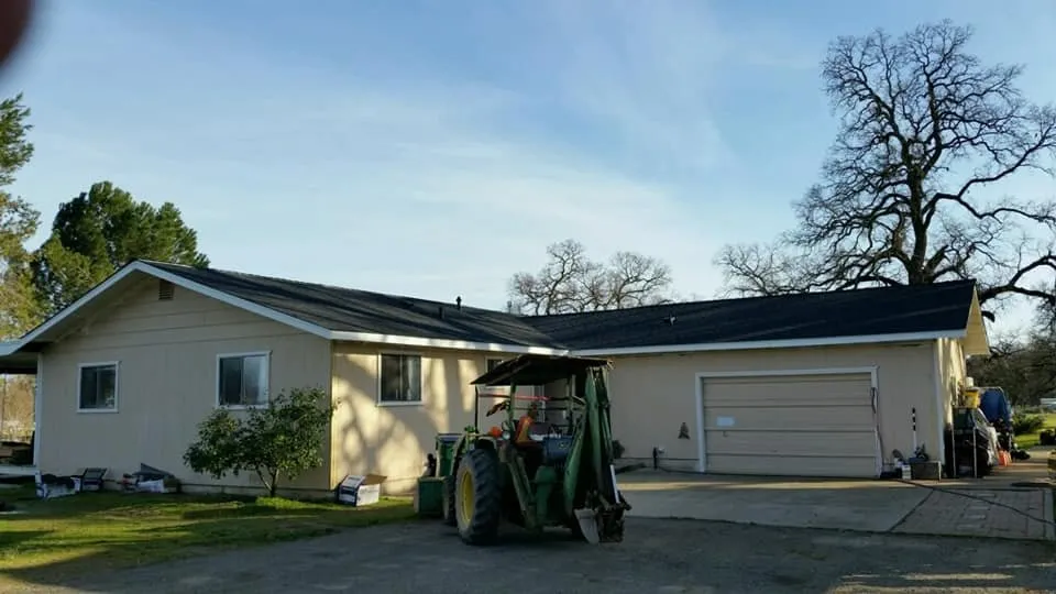 Slide of Mackney Roofing