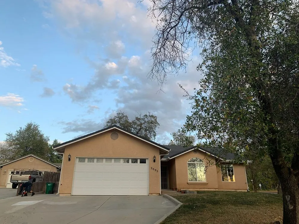 Slide of Mackney Roofing