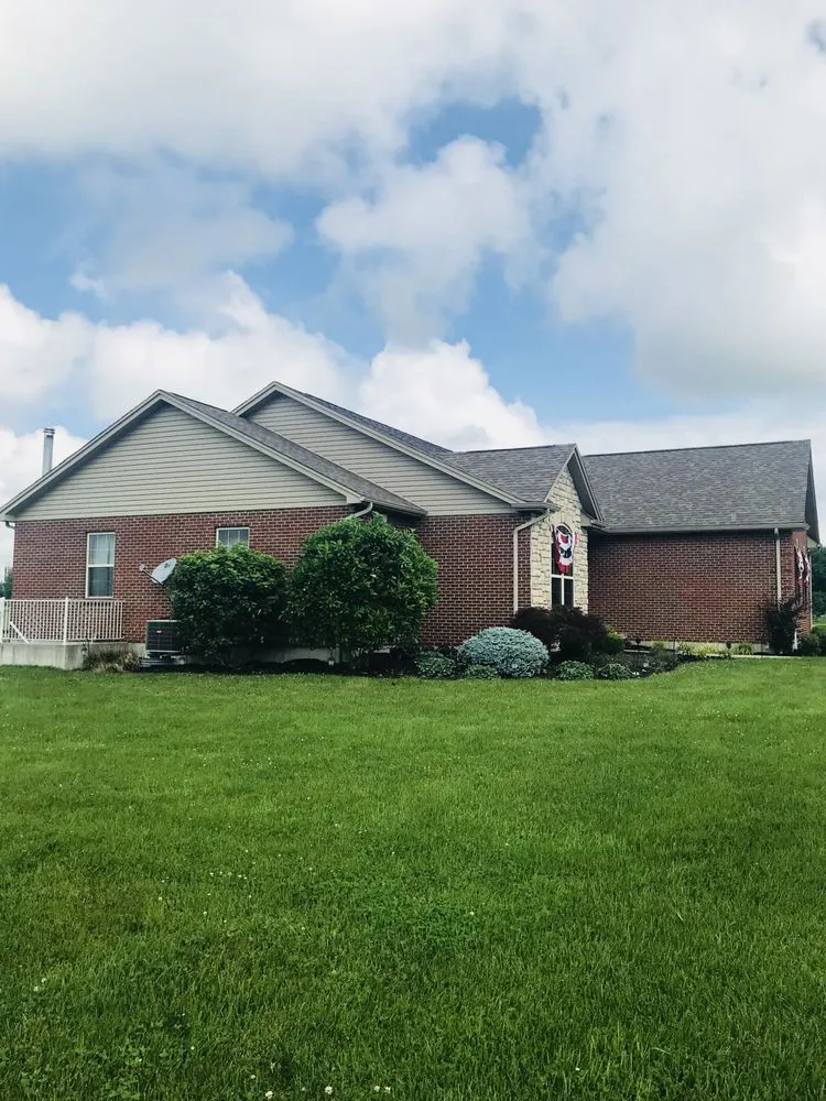 Slide of Madcat Roofing