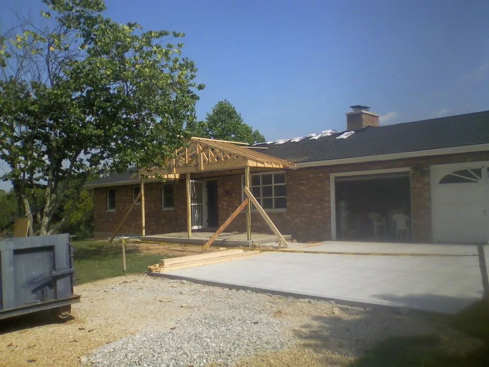 Slide of Madcat Roofing