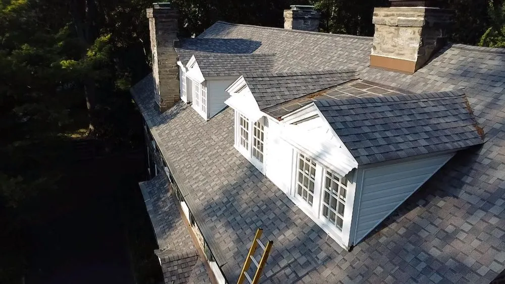 Slide of Made in America Roofing