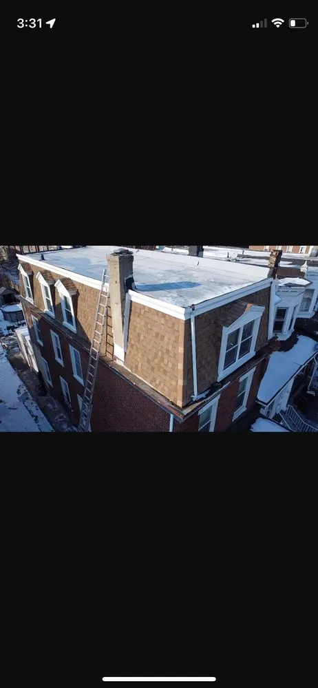 Slide of Made in America Roofing