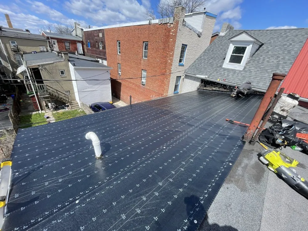 Slide of Made in America Roofing