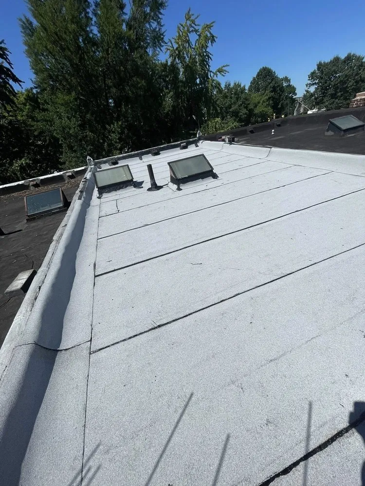 Slide of Made in America Roofing