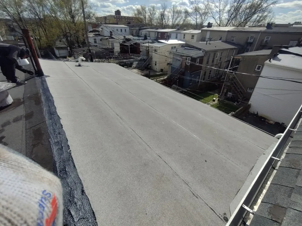 Slide of Made in America Roofing