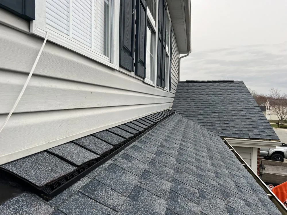 Slide of Maen Roofing