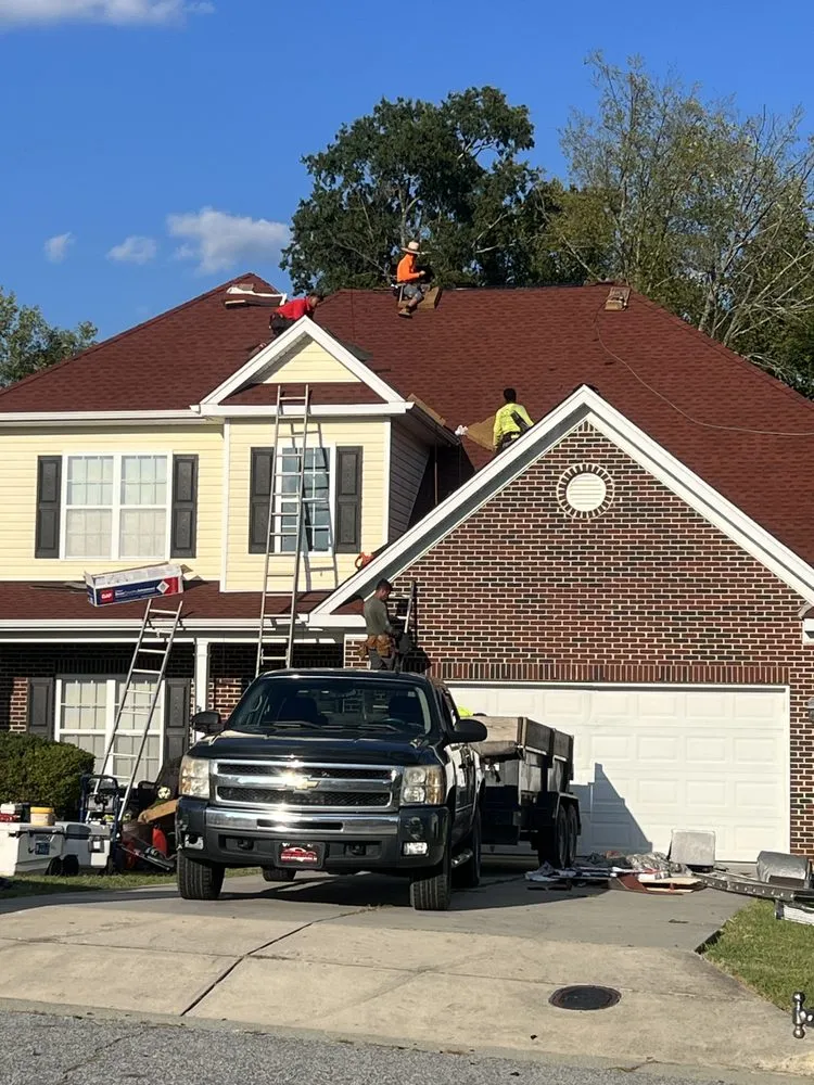 Slide of Maen Roofing