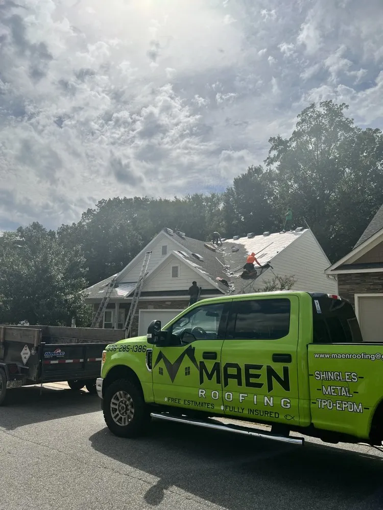 Slide of Maen Roofing