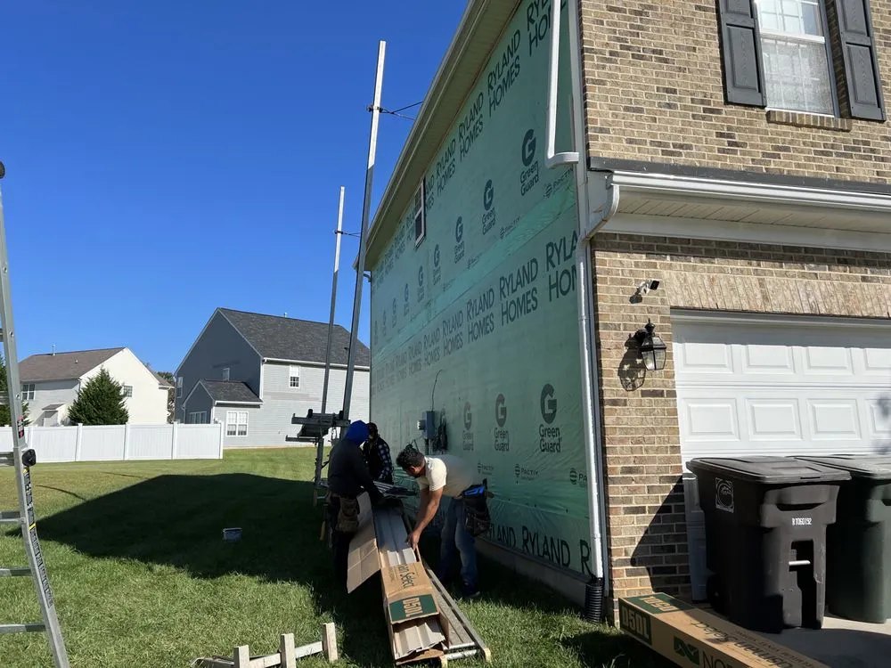 Slide of Maen Roofing