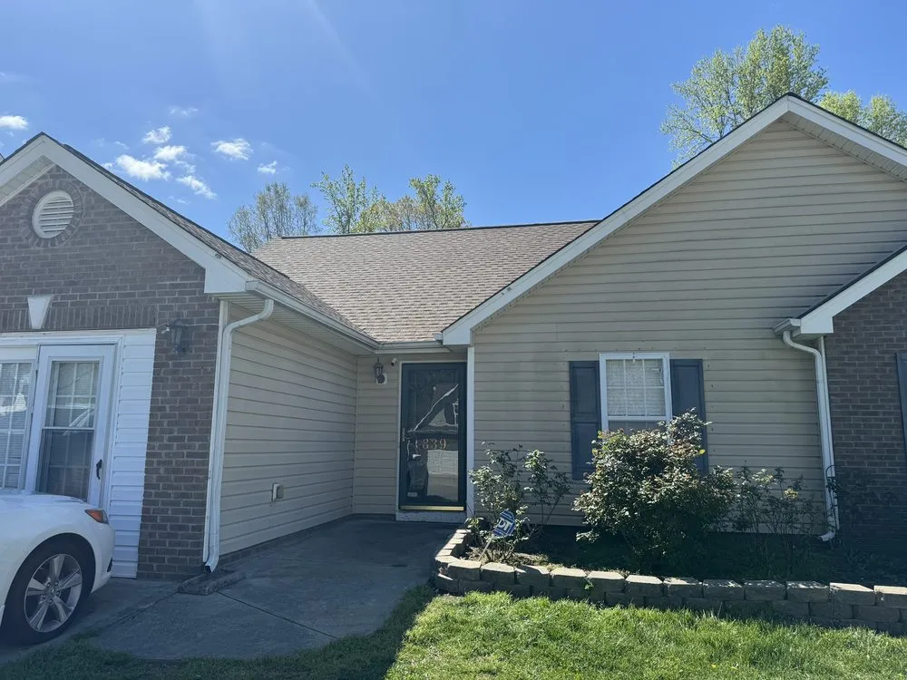 Slide of Maen Roofing