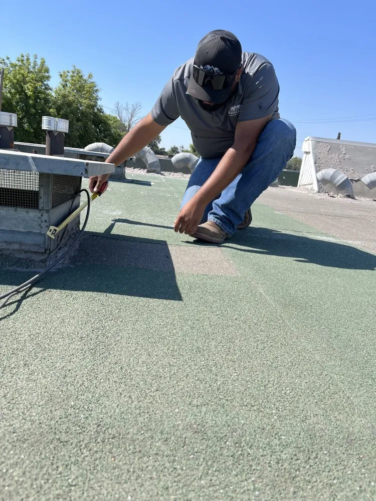 Slide of Magallon's Roofing