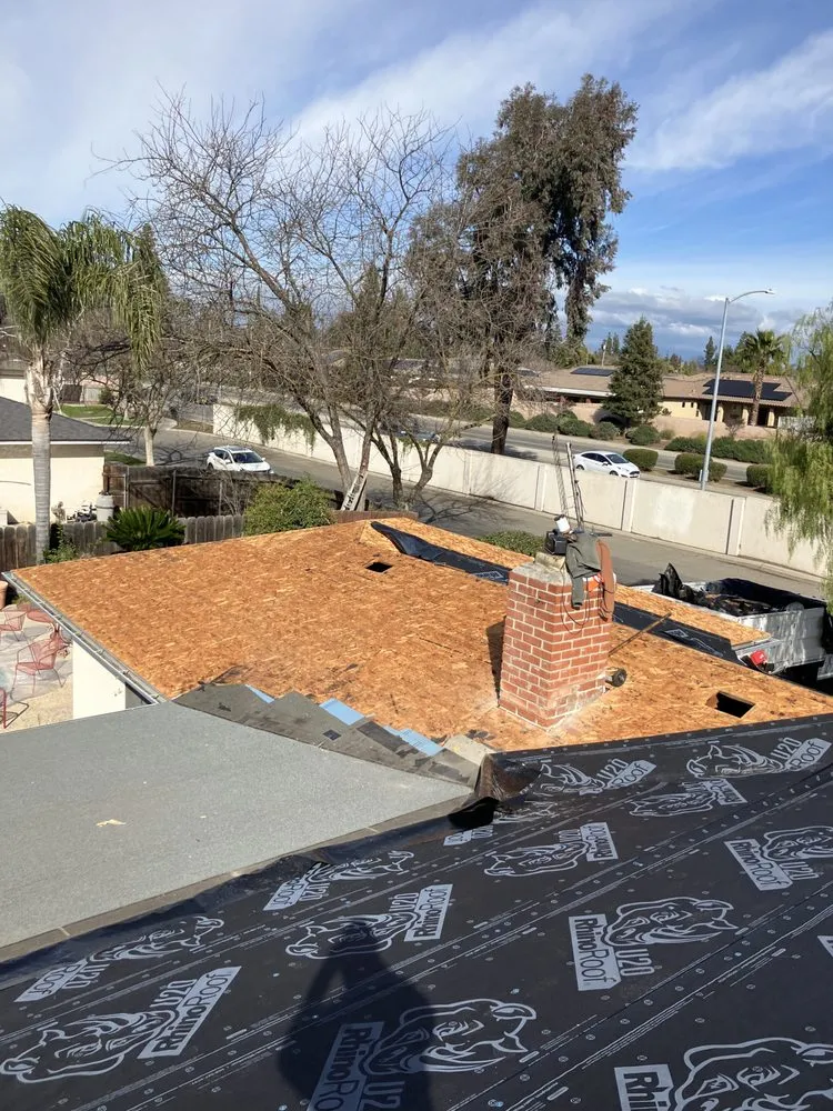 Slide of Magallon's Roofing