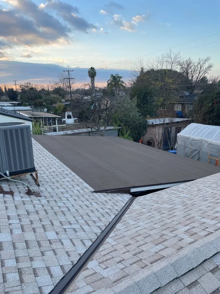 Slide of Magallon's Roofing