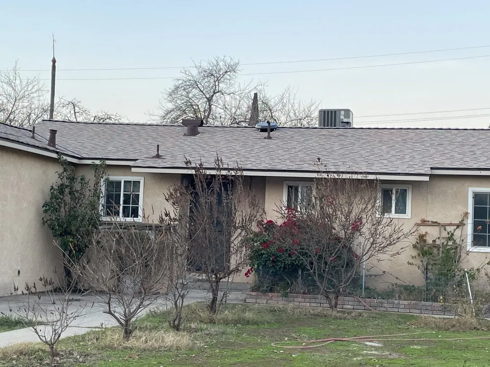 Slide of Magallon's Roofing