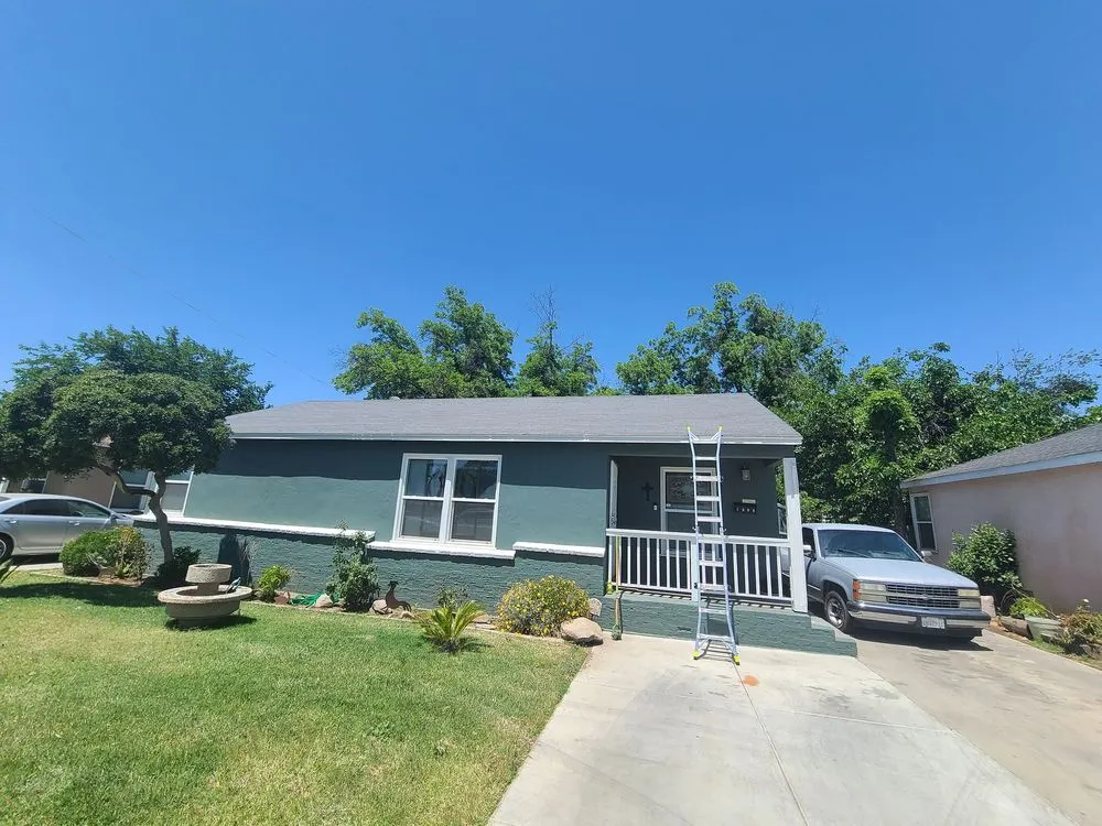 Slide of Magallon's Roofing