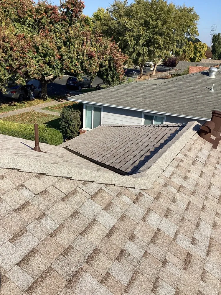 Slide of Magallon's Roofing