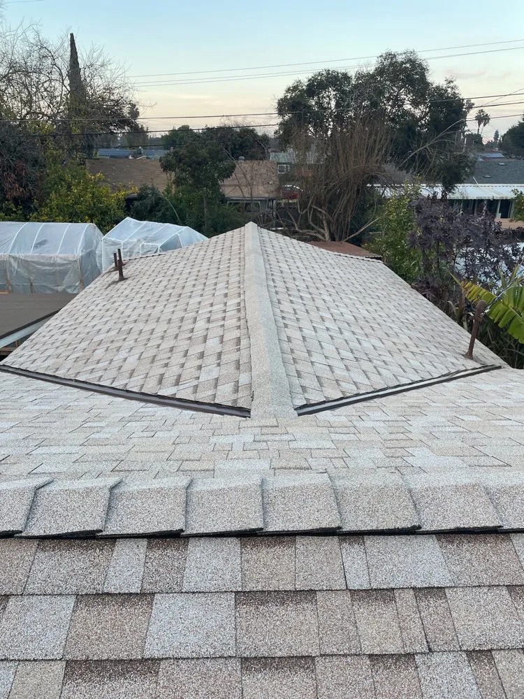 Slide of Magallon's Roofing