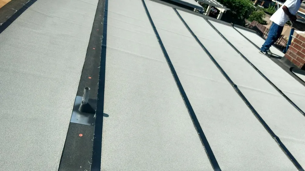 Slide of Magic Hands Roofing