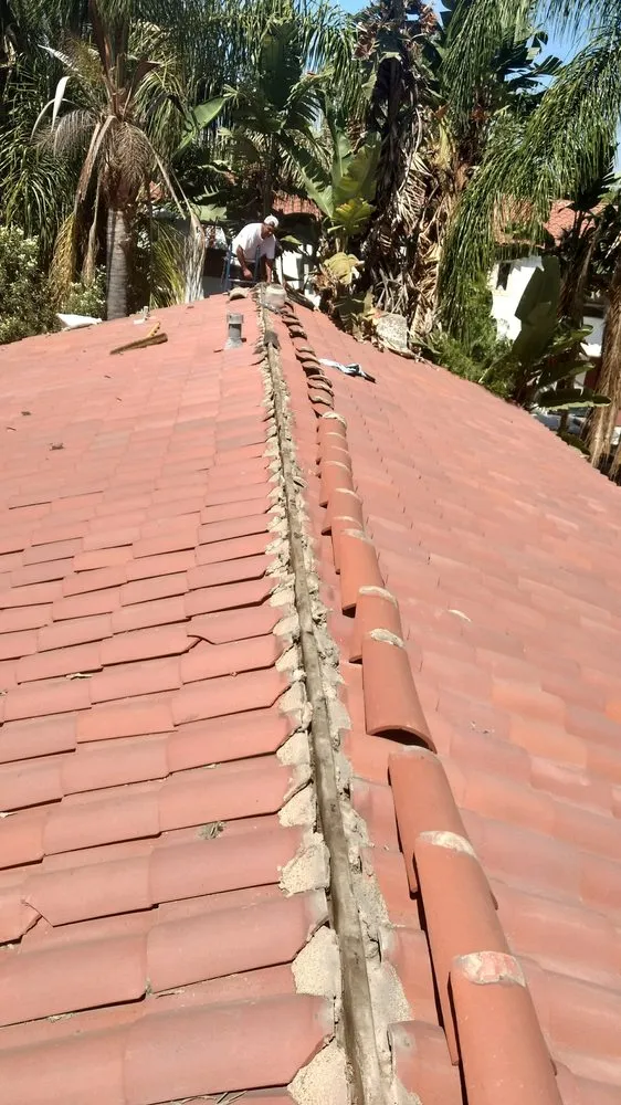 Slide of Magic Hands Roofing