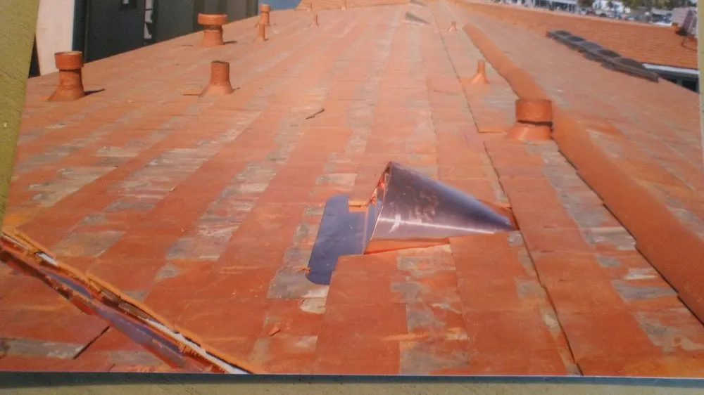 Slide of Magic Hands Roofing