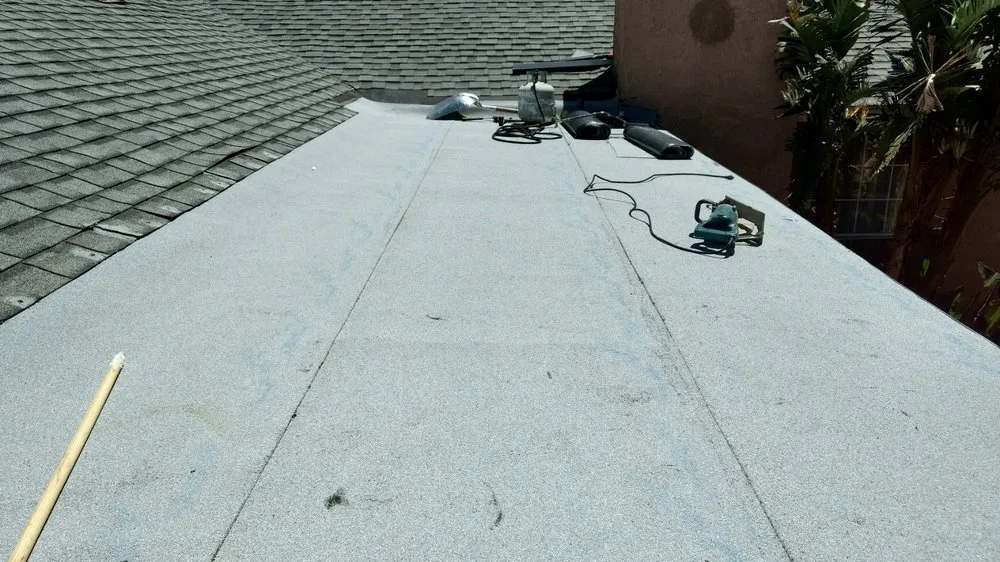 Slide of Magic Hands Roofing