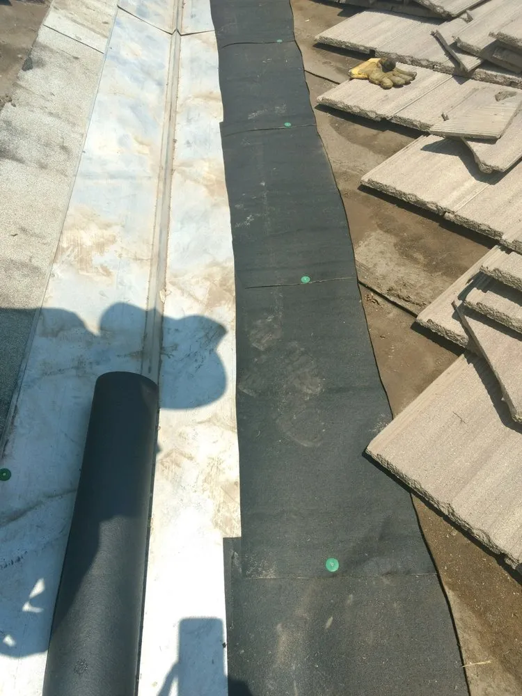 Slide of Magic Hands Roofing