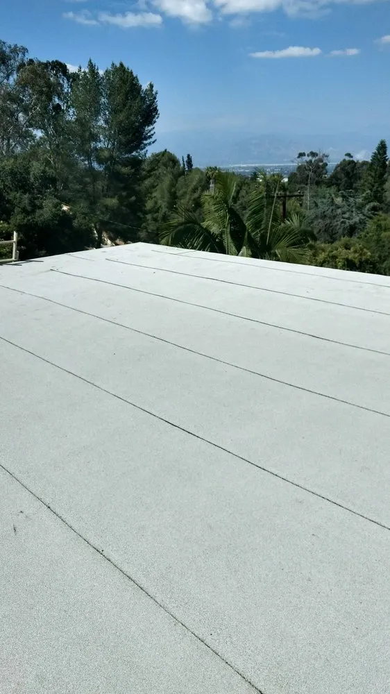 Slide of Magic Hands Roofing