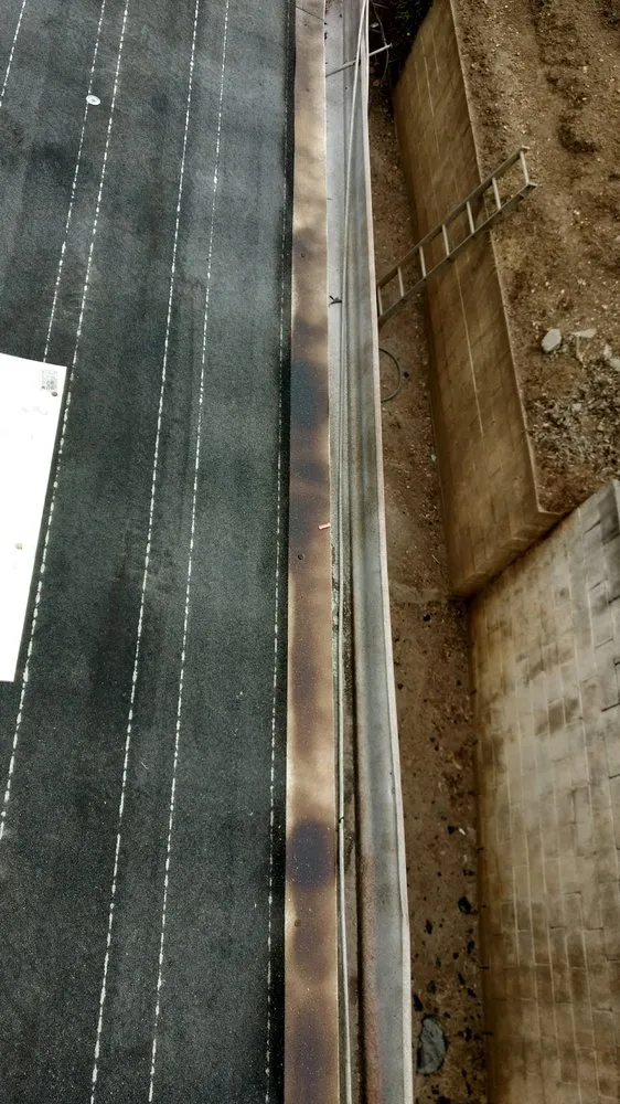 Slide of Magic Hands Roofing