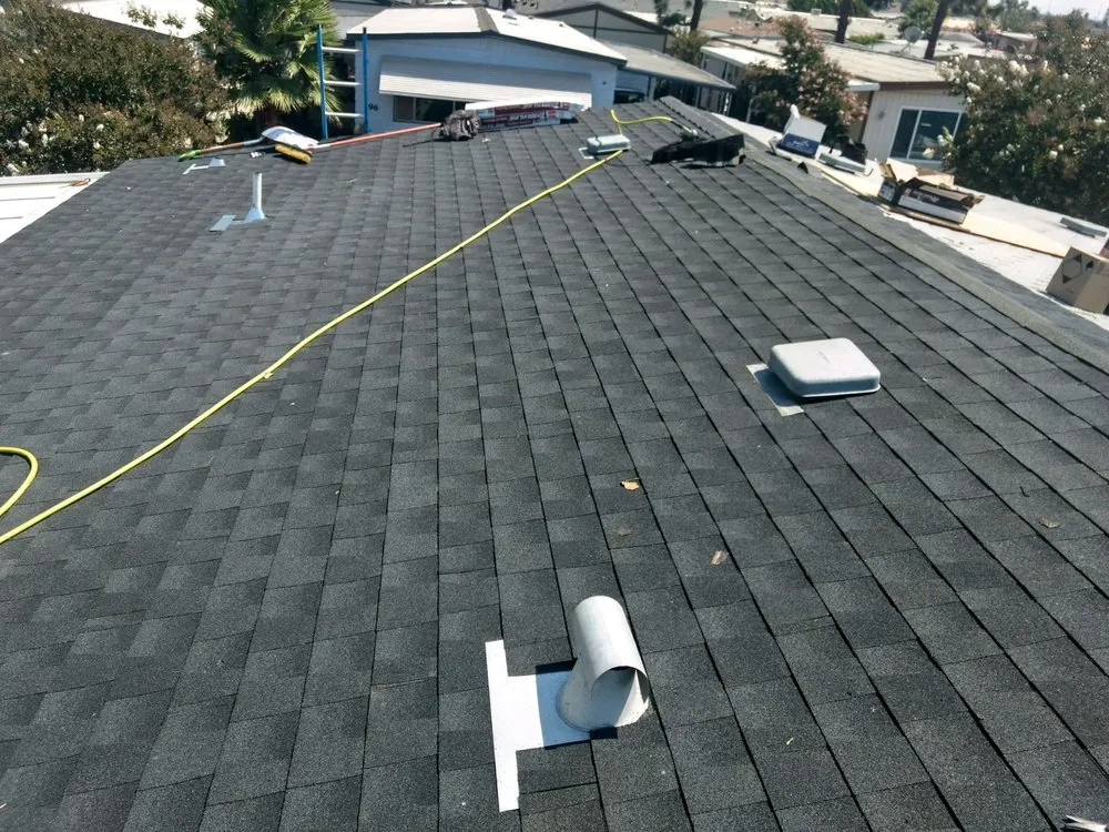 Slide of Magic Hands Roofing