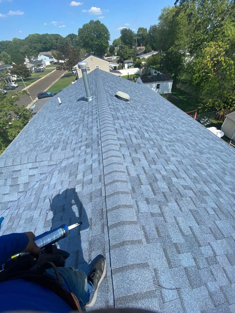 Slide of Magic Roofing & Siding