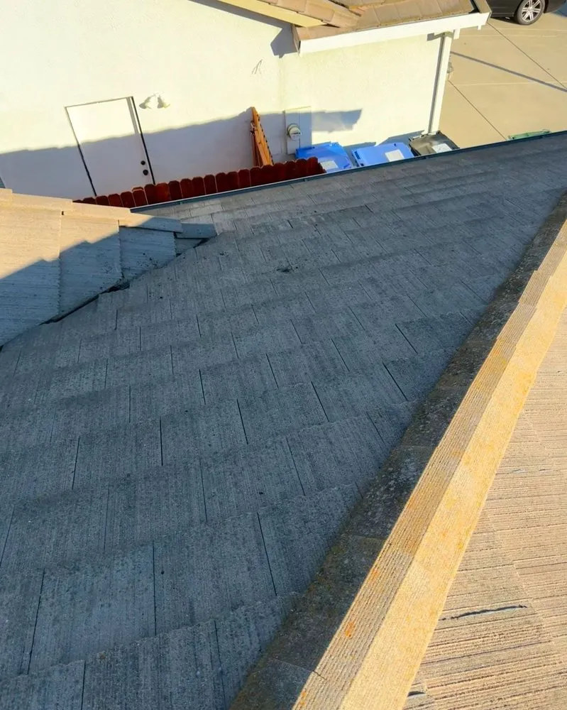 Slide of Maginis Roofing