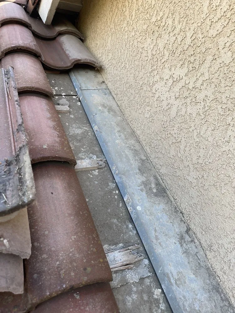 Slide of Maginis Roofing