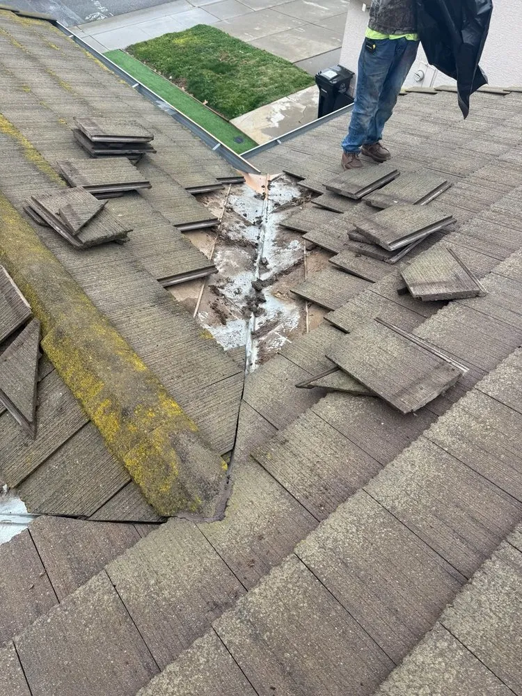 Slide of Maginis Roofing