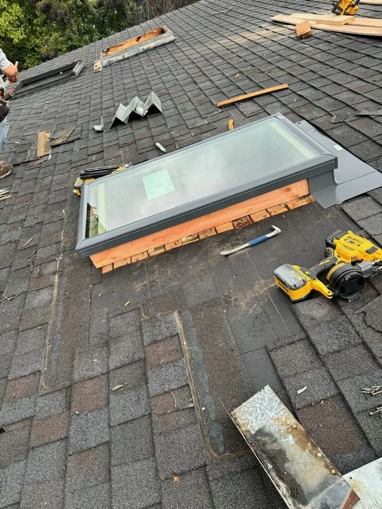 Slide of Maginis Roofing