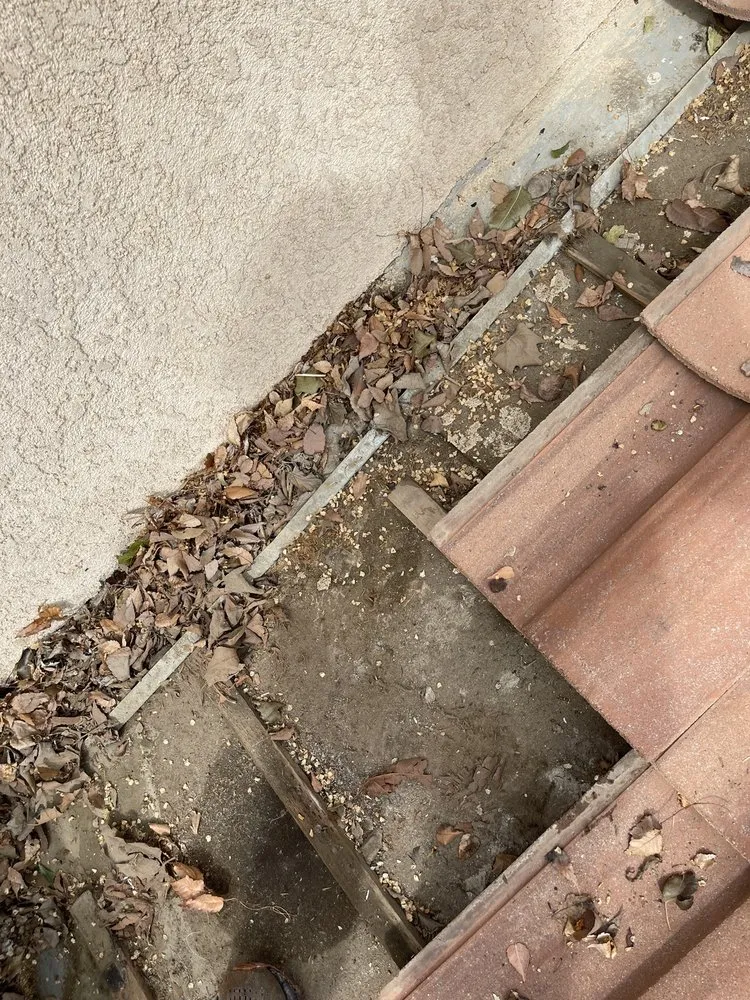 Slide of Maginis Roofing