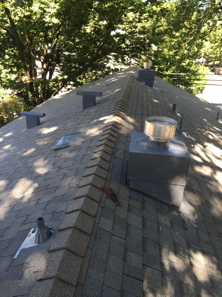 Slide of Maginis Roofing