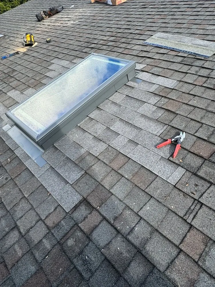 Slide of Maginis Roofing