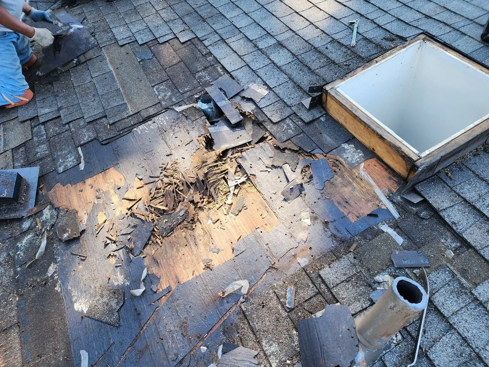 Slide of Magnabosco's Roofing & Repairs