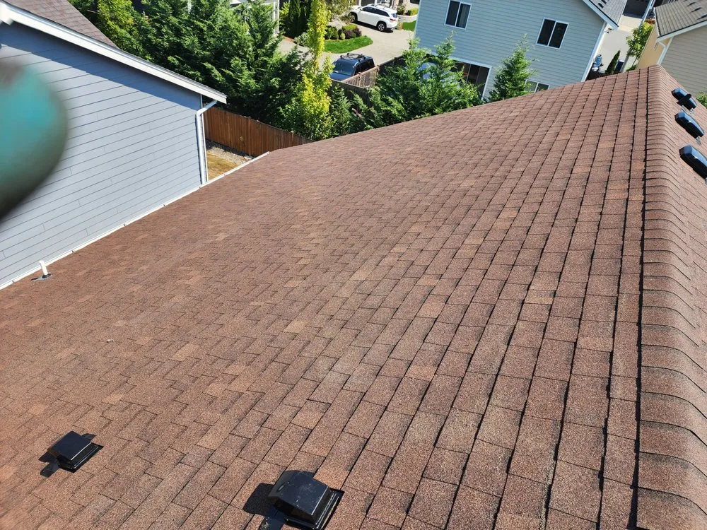 Slide of Magnabosco's Roofing & Repairs