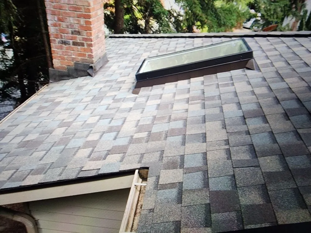 Slide of Magnabosco's Roofing & Repairs