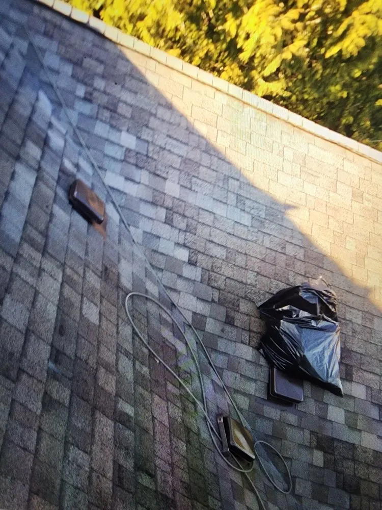 Slide of Magnabosco's Roofing & Repairs