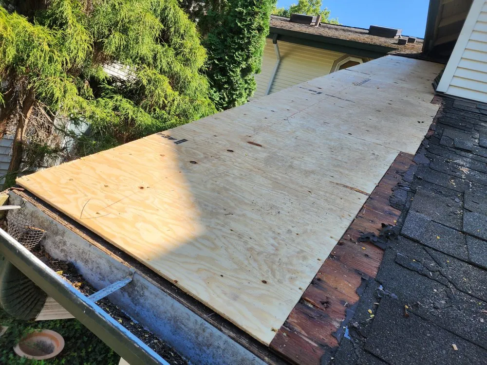 Slide of Magnabosco's Roofing & Repairs