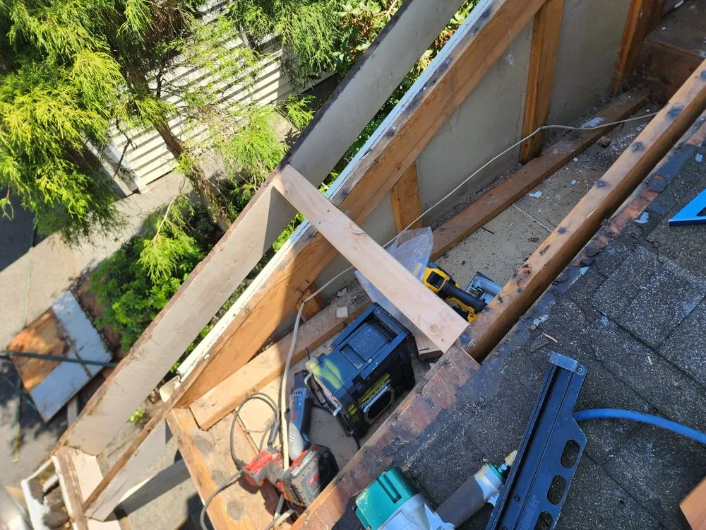 Slide of Magnabosco's Roofing & Repairs