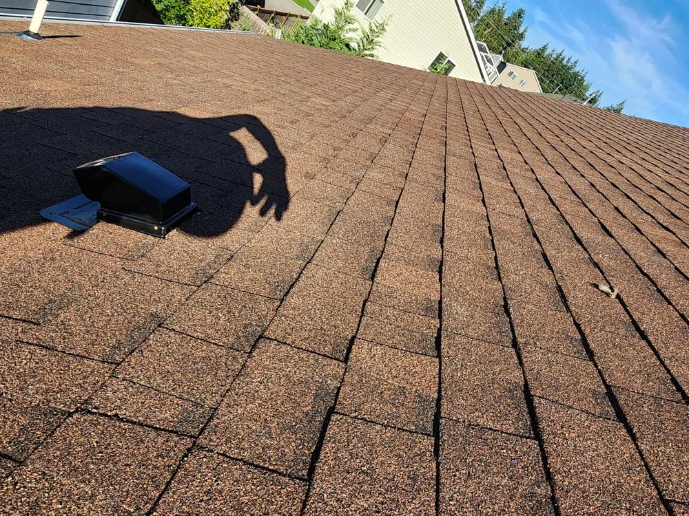 Slide of Magnabosco's Roofing & Repairs