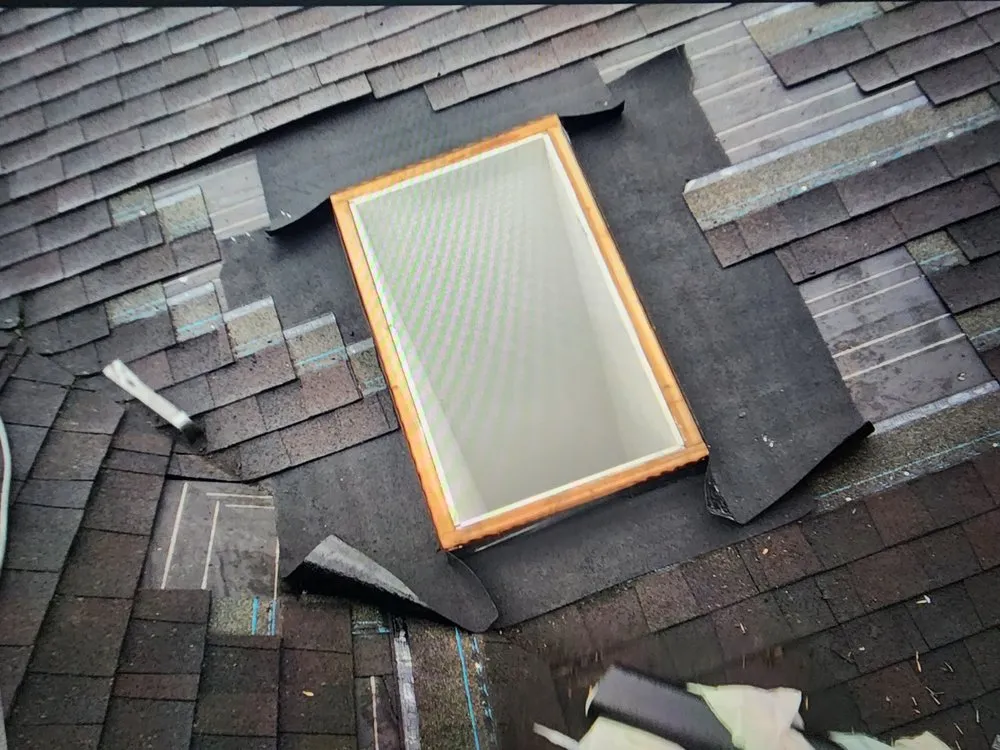 Slide of Magnabosco's Roofing & Repairs