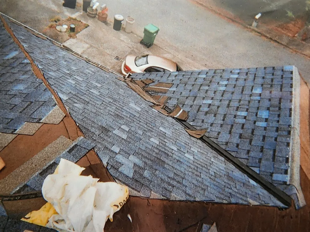 Slide of Magnabosco's Roofing & Repairs