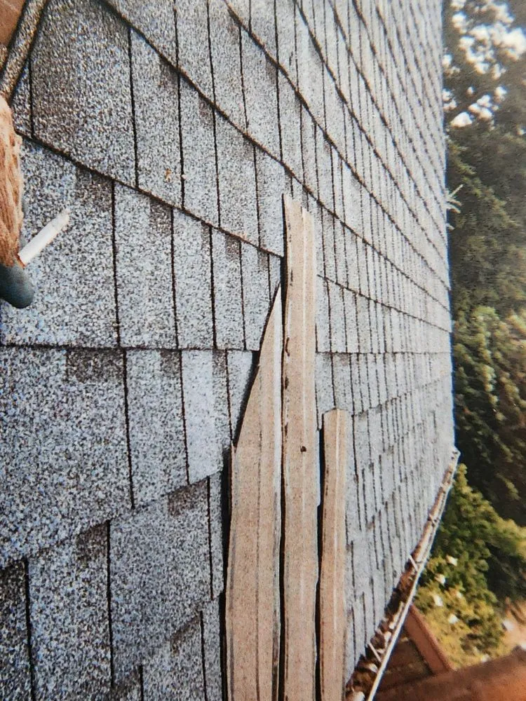 Slide of Magnabosco's Roofing & Repairs